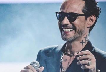 Marc Anthony conmueve en concierto al cantarle a niño con discapacidad visual