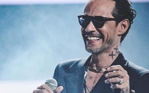 Marc Anthony conmueve en concierto al cantarle a niño con discapacidad visual