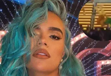 Caída de Karol G en pleno concierto genera acusaciones de playback en su contra
