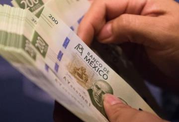 Aguinaldos de funcionarios se pagarán completos este año: AMLO