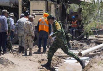 Familias de mineros atrapados en Coahuila, exigen ayuda de rescatistas del extranjero