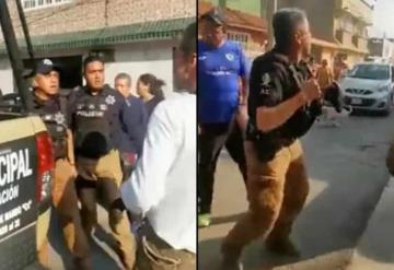 "Rífate un tiro, carnal": captan pelea entre policía y ciudadano en calles de Ecatepec