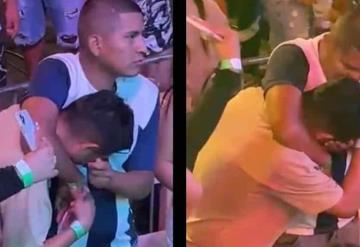 ¡Soldado caído! Joven llora en pleno concierto al recordar a su ex y su  amigo lo consuela