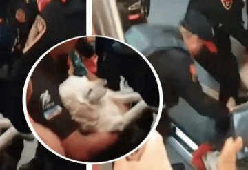 Policías sacan a hombre con perrito herido del Metro CDMX