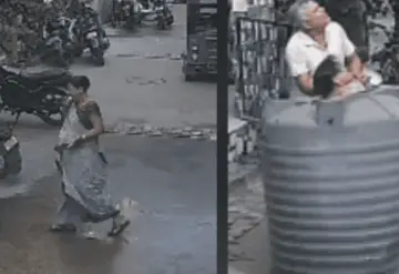 Tinaco de agua cae sobre mujer mientras caminaba por la calle y sobrevive