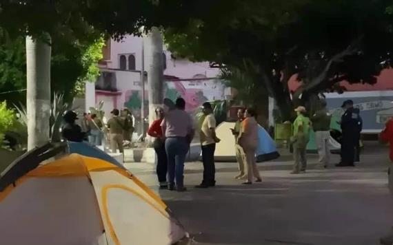 Migrantes se niegan a desalojar campamento instalado en Tuxtla Gutiérrez, Chiapas