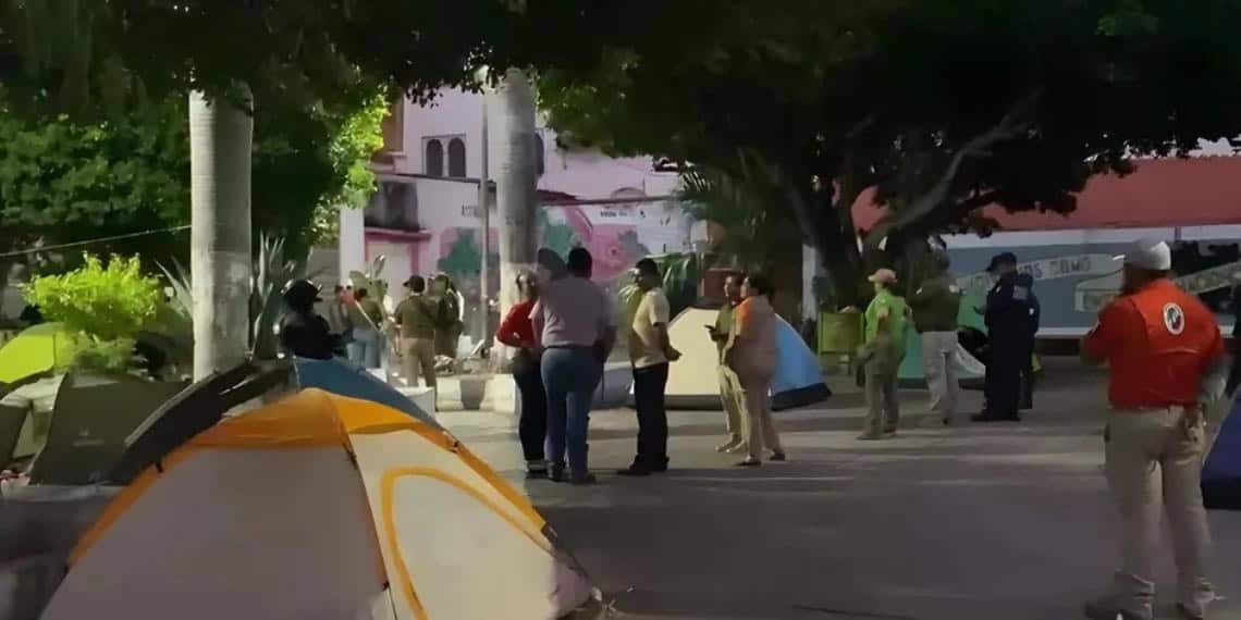 Migrantes se niegan a desalojar campamento instalado en Tuxtla Gutiérrez, Chiapas