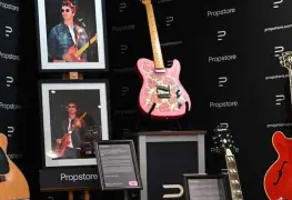 Subastada la guitarra rota que provocó la separación de Oasis