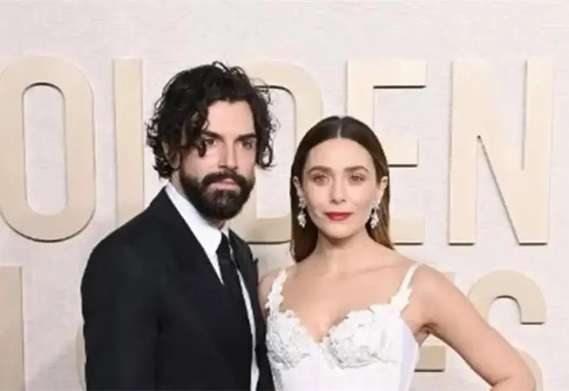 Robbie Arnett y Elizabeth Olsen esperan un beb&eacute;